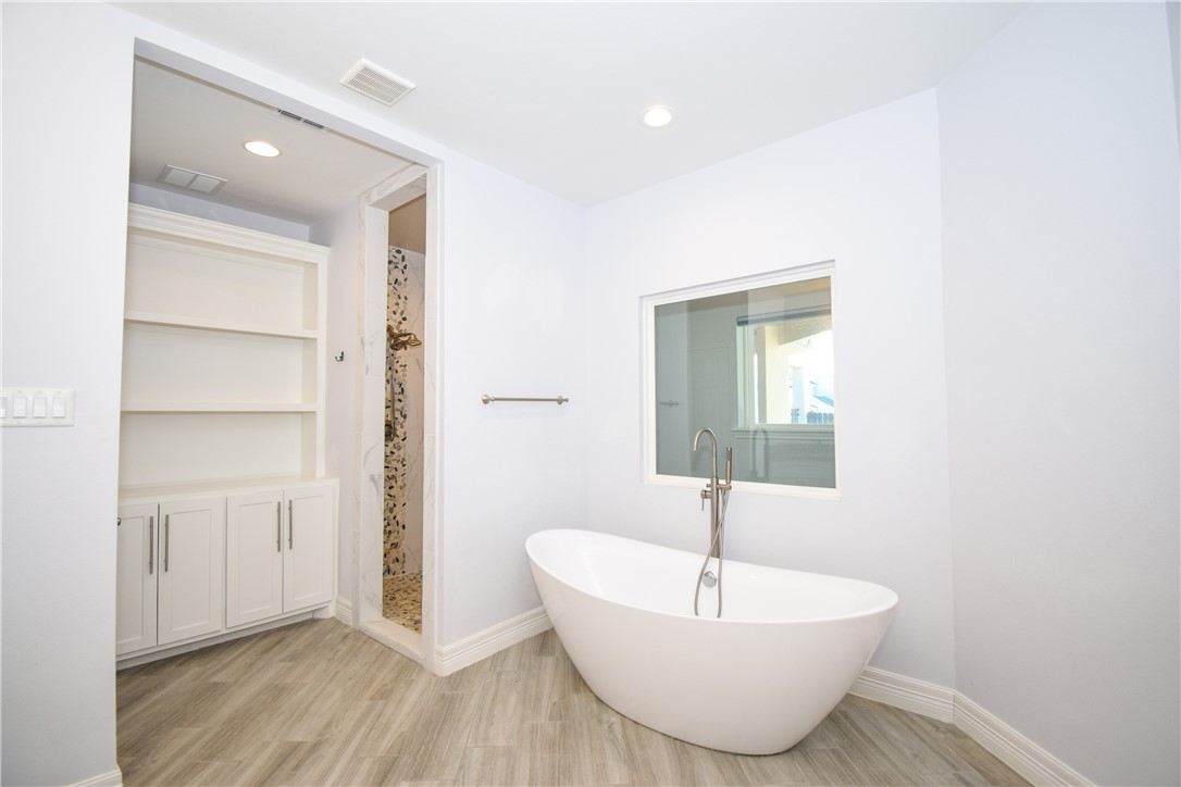 16026 Cuttysark Street Corpus Christi, TX 78418 - Photo 20 of 37 a bathroom with a sink and a mirror