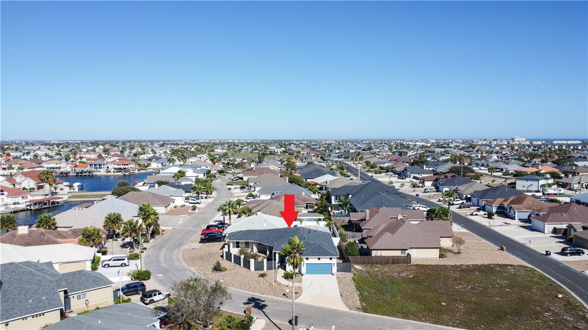16026 Cuttysark Street Corpus Christi, TX 78418 - Photo 2 of 37 an aerial view of a houses with a swimming pool