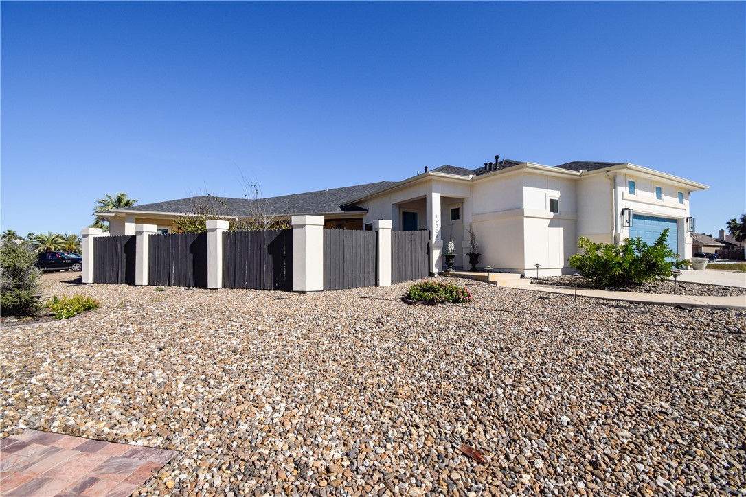 16026 Cuttysark Street Corpus Christi, TX 78418 - Photo 3 of 37 a front view of a house with a yard
