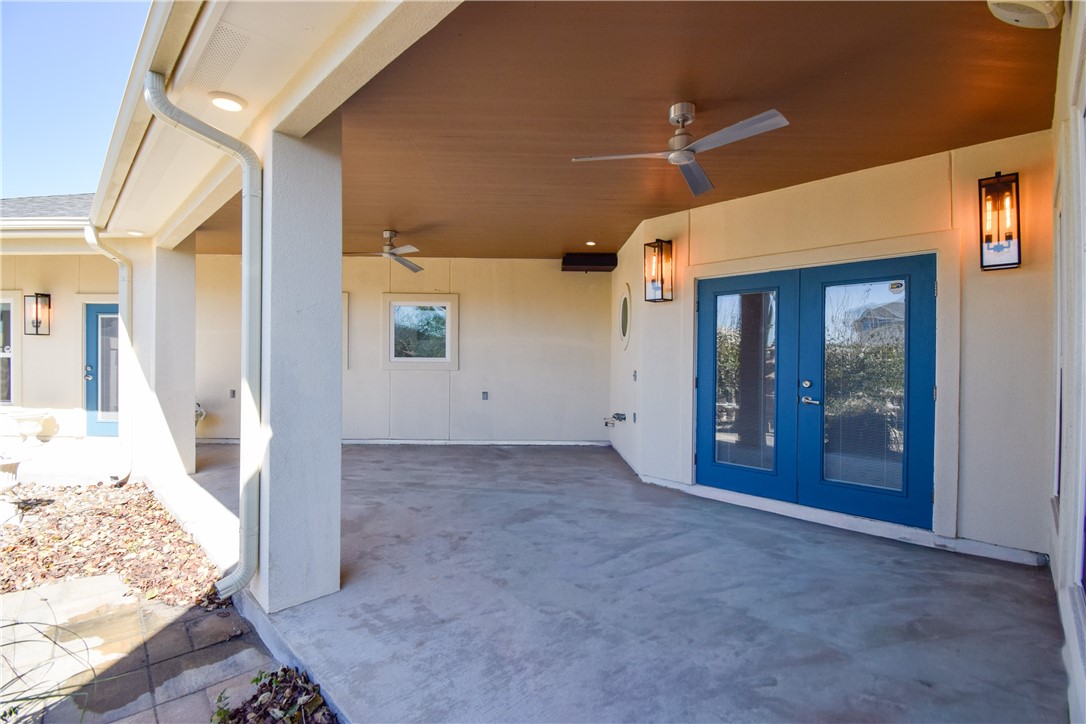16026 Cuttysark Street Corpus Christi, TX 78418 - Photo 35 of 37 a view of a big room with windows and chandelier