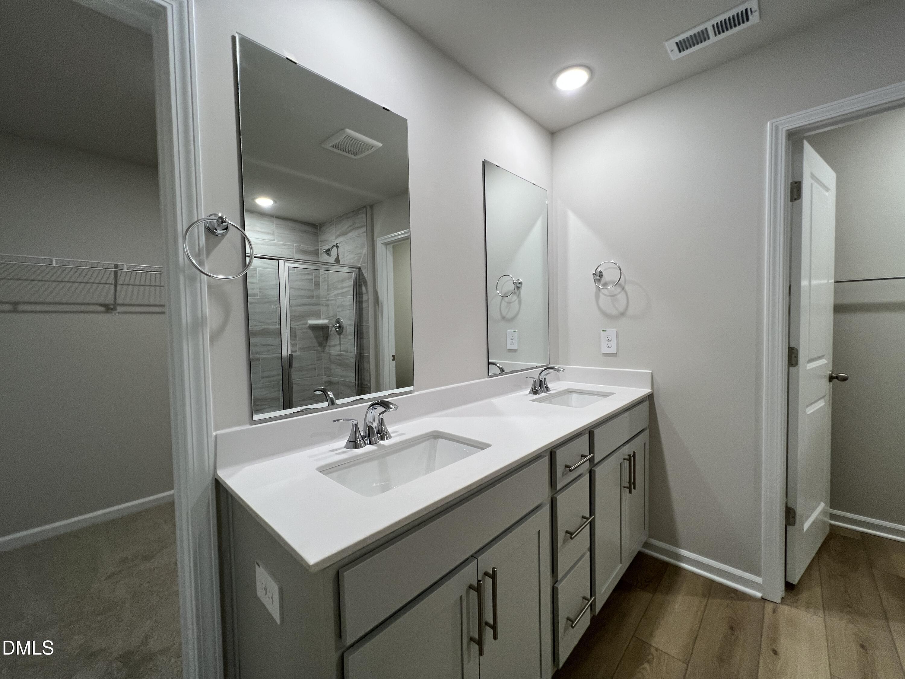 212 Thistle Patch Place Angier, NC 27501 - Photo 17 of 32 a bathroom with a sink toilet and shower