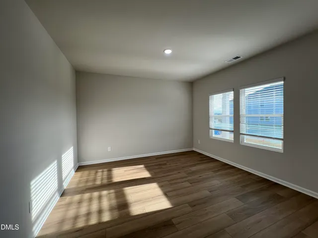 a black and white photo of a living room