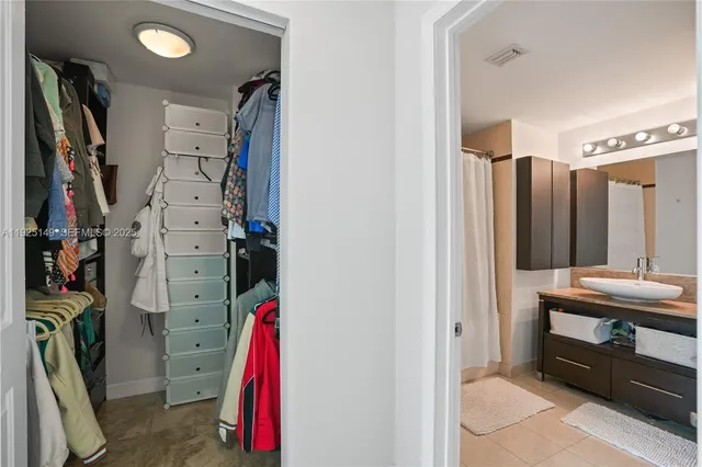 a work room with furniture and a window