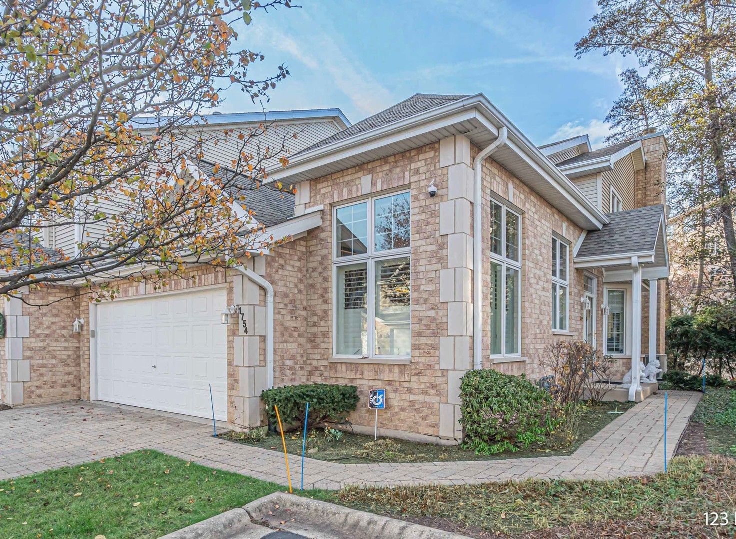 1754 Park Ridge Point, Unit 1754 Park Ridge, IL 60068 - Photo 1 of 39 front view of a house with a yard
