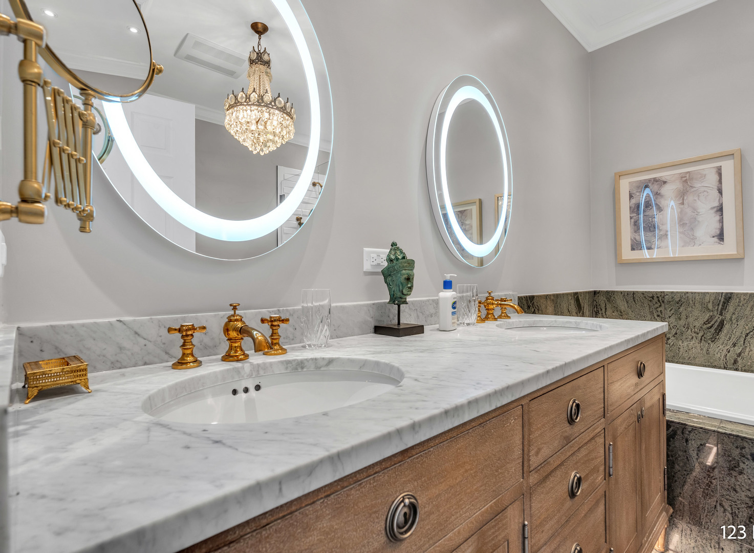1754 Park Ridge Point, Unit 1754 Park Ridge, IL 60068 - Photo 17 of 39 a bathroom with a granite countertop sink and a mirror