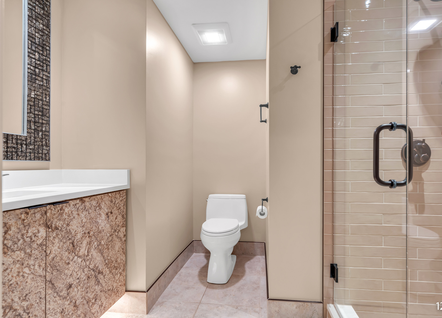 1754 Park Ridge Point, Unit 1754 Park Ridge, IL 60068 - Photo 28 of 39 a bathroom with a toilet and a shower