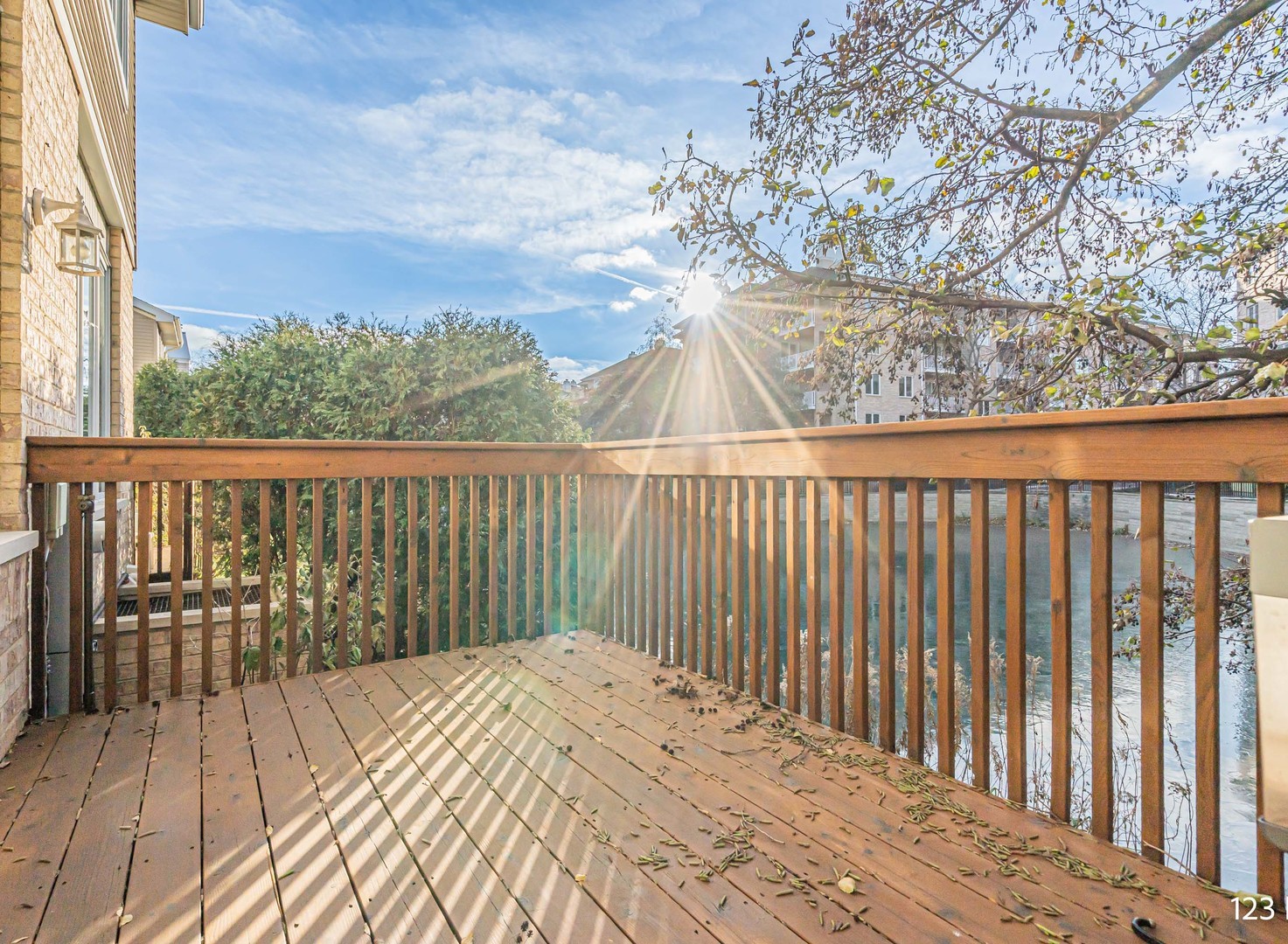 1754 Park Ridge Point, Unit 1754 Park Ridge, IL 60068 - Photo 34 of 39 a view of a balcony with wooden floor and fence