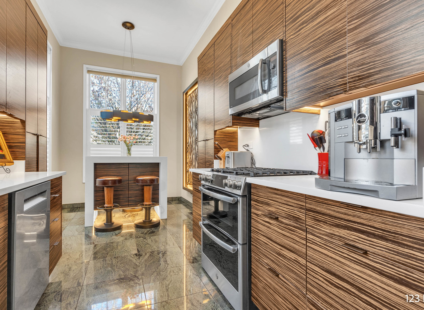 1754 Park Ridge Point, Unit 1754 Park Ridge, IL 60068 - Photo 6 of 39 a kitchen with stainless steel appliances granite countertop a stove and a sink
