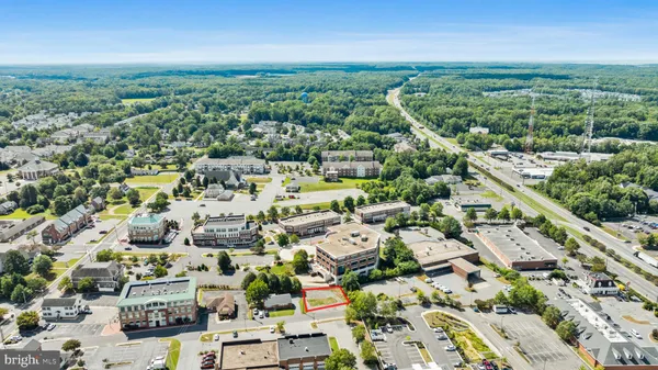 an aerial view of residential building with outdoor space