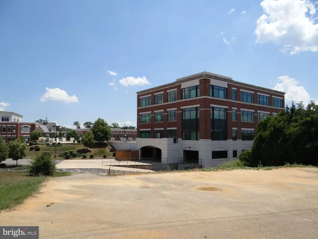 a view of building with yard