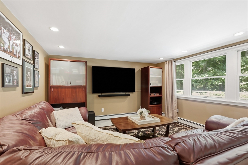 2 Olde Lyme Road Winchester, MA 01890 - Photo 31 of 42 a bedroom with a bed and glass window