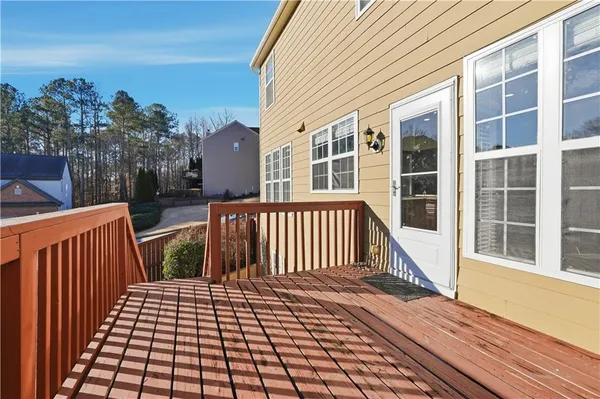 a view of a brick house with wooden floor