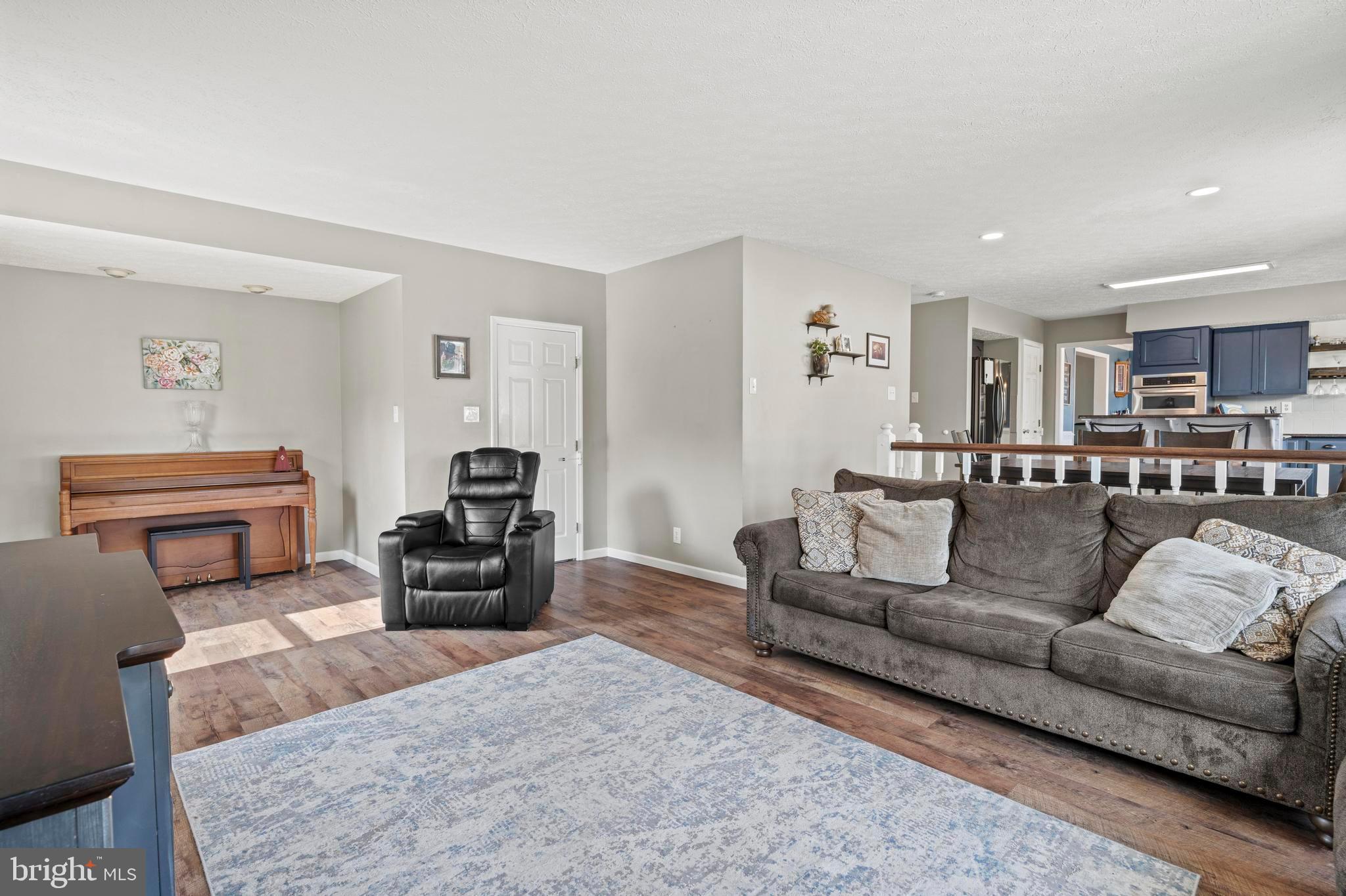 181 Aberdeen Road Williamstown, NJ 08094 - Photo 13 of 29 a living room with furniture and a couch