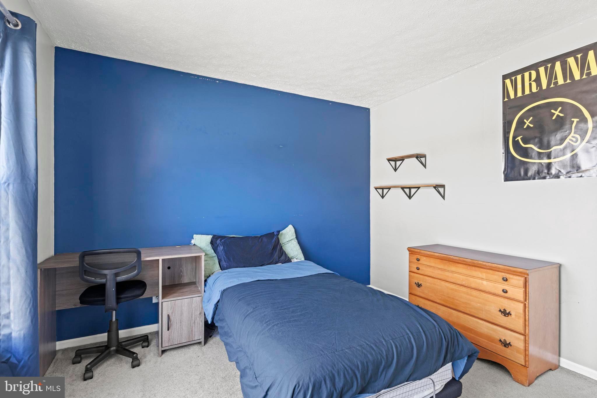 181 Aberdeen Road Williamstown, NJ 08094 - Photo 14 of 29 a bedroom with a bed and a lamp on dresser