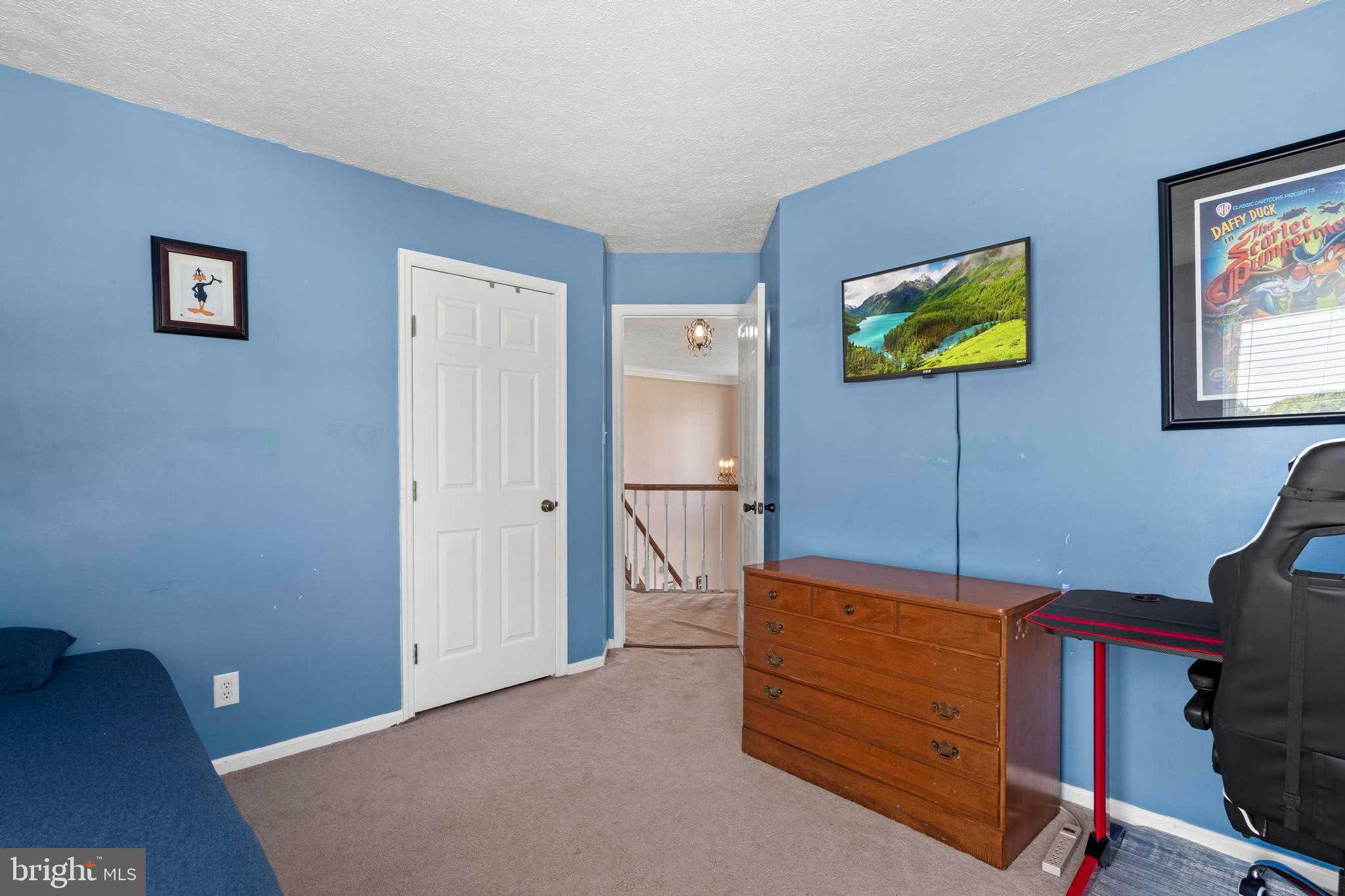 181 Aberdeen Road Williamstown, NJ 08094 - Photo 16 of 29 a bed room with a bed and a television