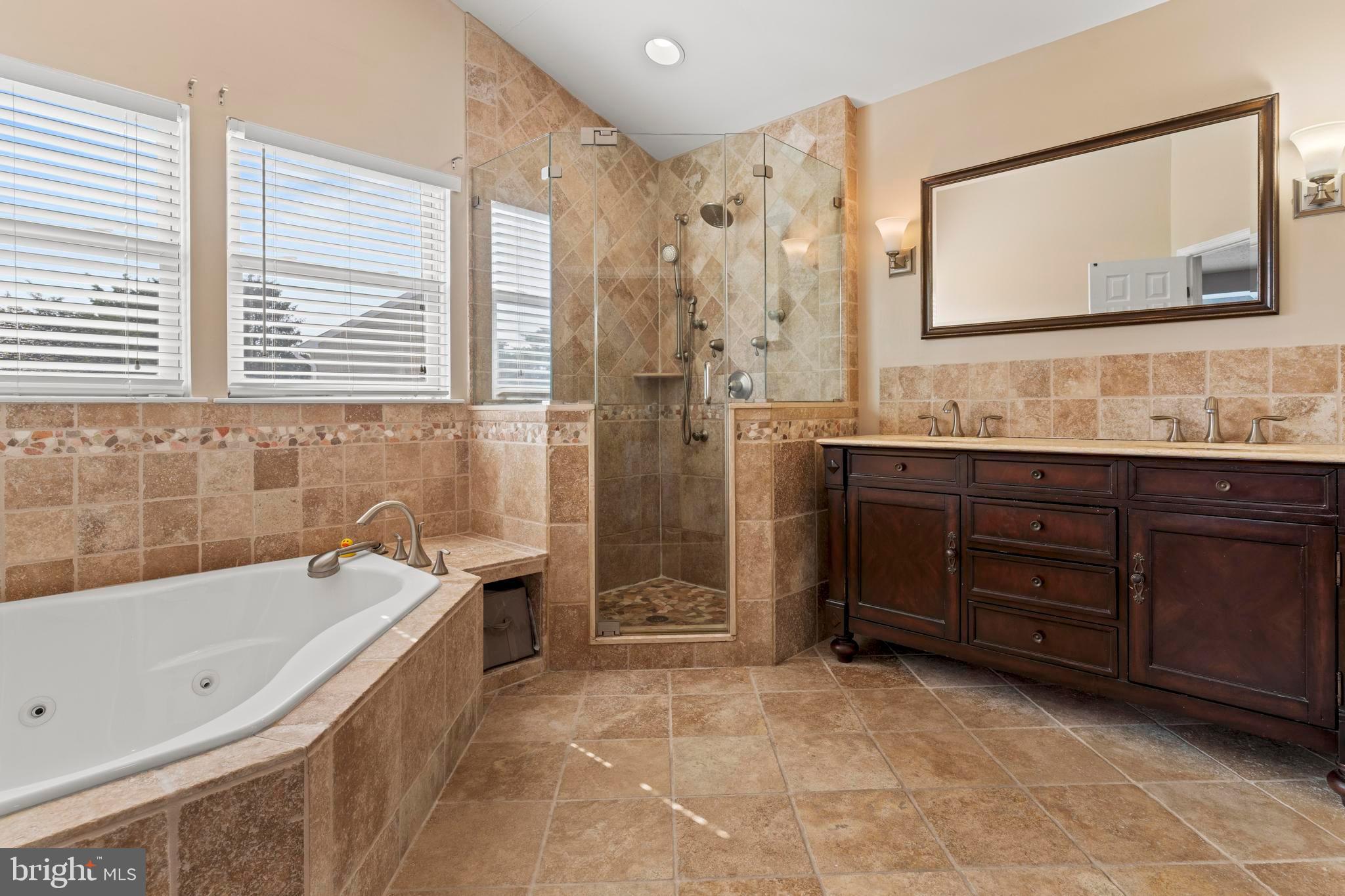 181 Aberdeen Road Williamstown, NJ 08094 - Photo 20 of 29 a bathroom with a tub sink and mirror
