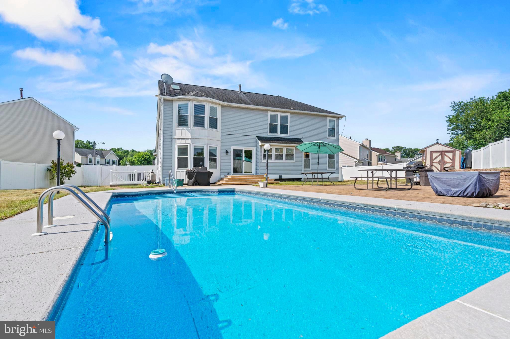 181 Aberdeen Road Williamstown, NJ 08094 - Photo 26 of 29 a swimming pool view with a outdoor seating