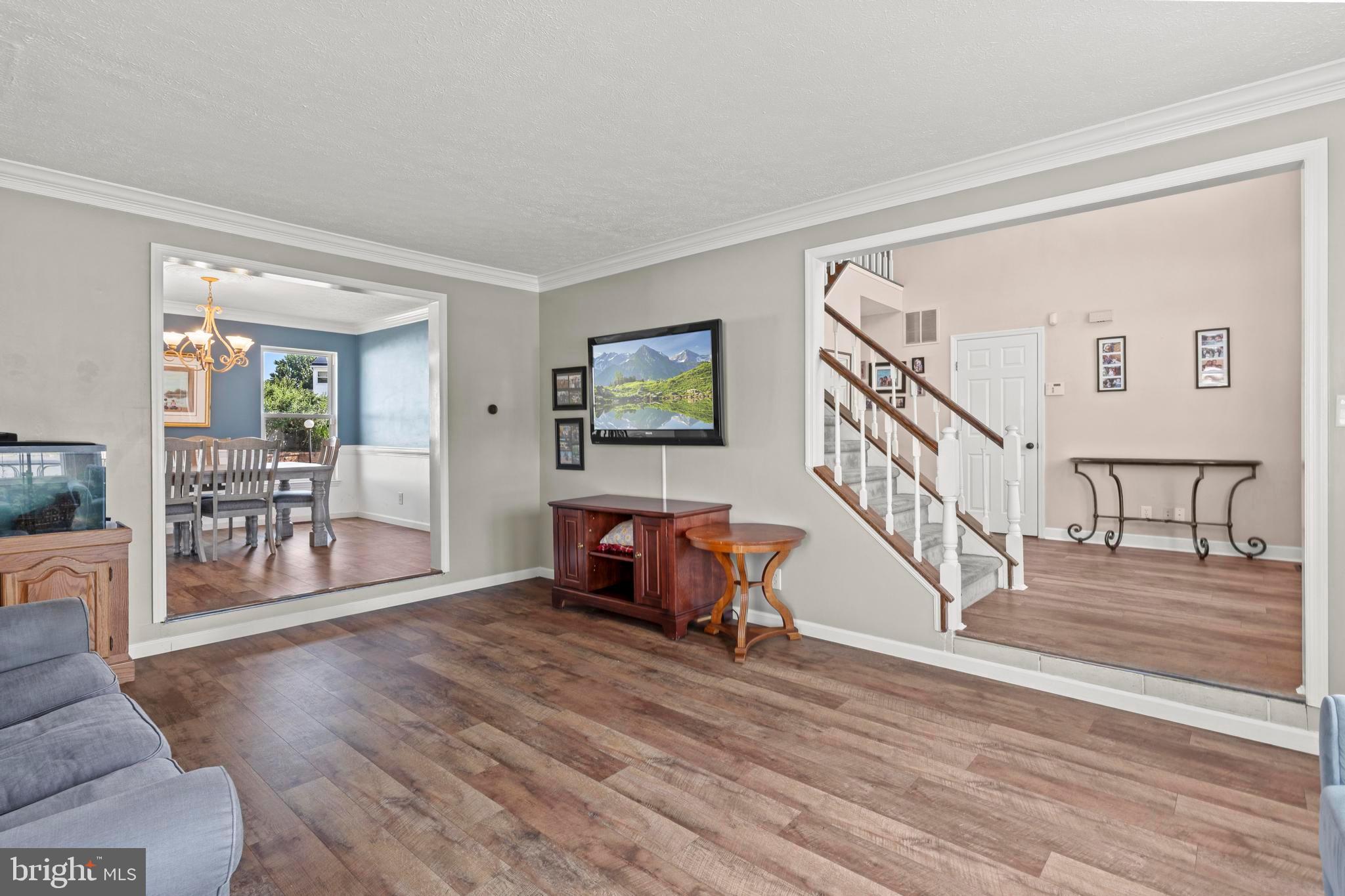 181 Aberdeen Road Williamstown, NJ 08094 - Photo 4 of 29 a living room with furniture and wooden floor