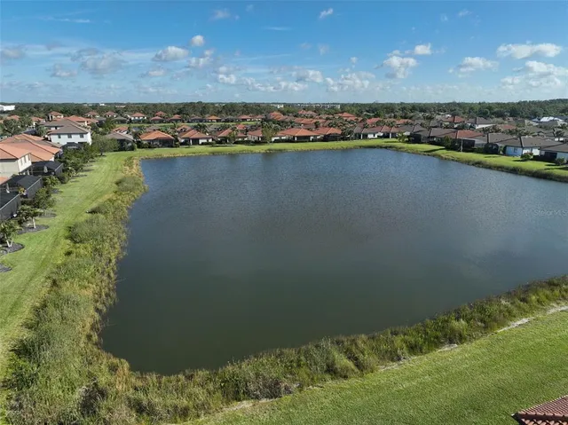 a view of a lake with a city