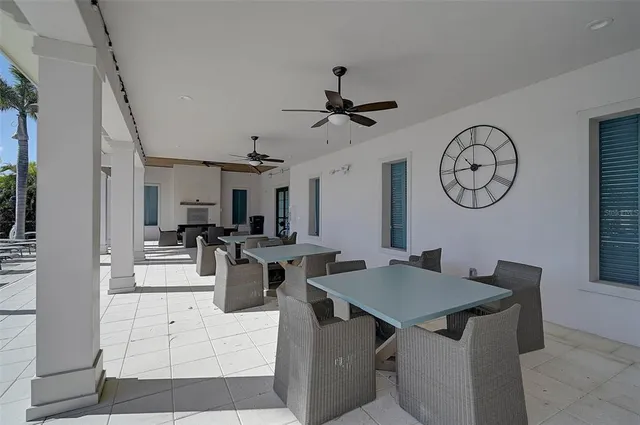 a view of kitchen island with furniture and stainless steel appliances