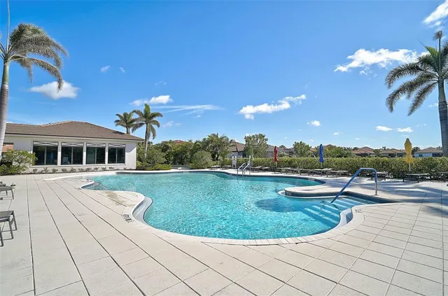 a view of a house with a swimming pool
