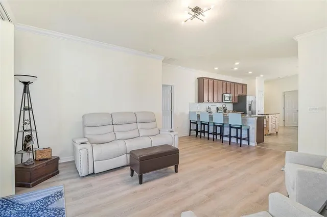 a living room with furniture and a table