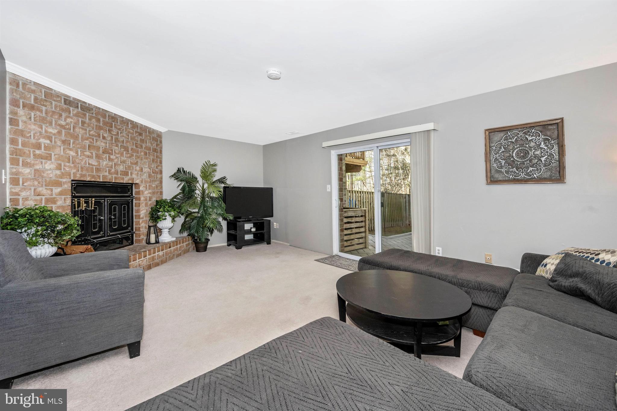 9735 Early Spring Way Columbia, MD 21046 - Photo 22 of 25 Lower Level Rec Room with 2nd WB Fireplace