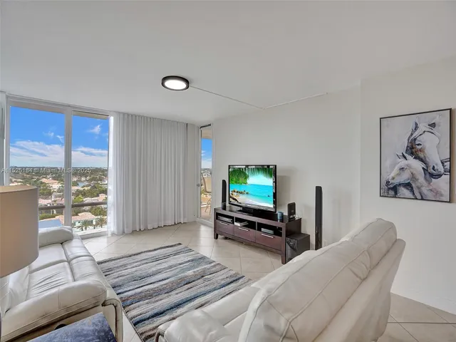a view of a dining area with furniture window and wooden floor
