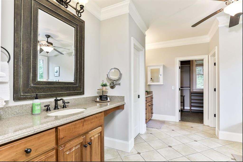 43 Toland Way Big Canoe, GA 30143 - Photo 28 of 50 a bathroom with a sink and a mirror