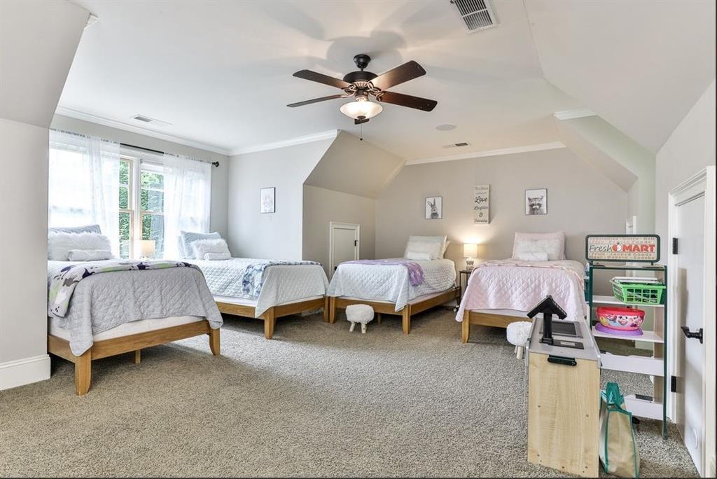 43 Toland Way Big Canoe, GA 30143 - Photo 34 of 50 a living room with furniture and a chandelier