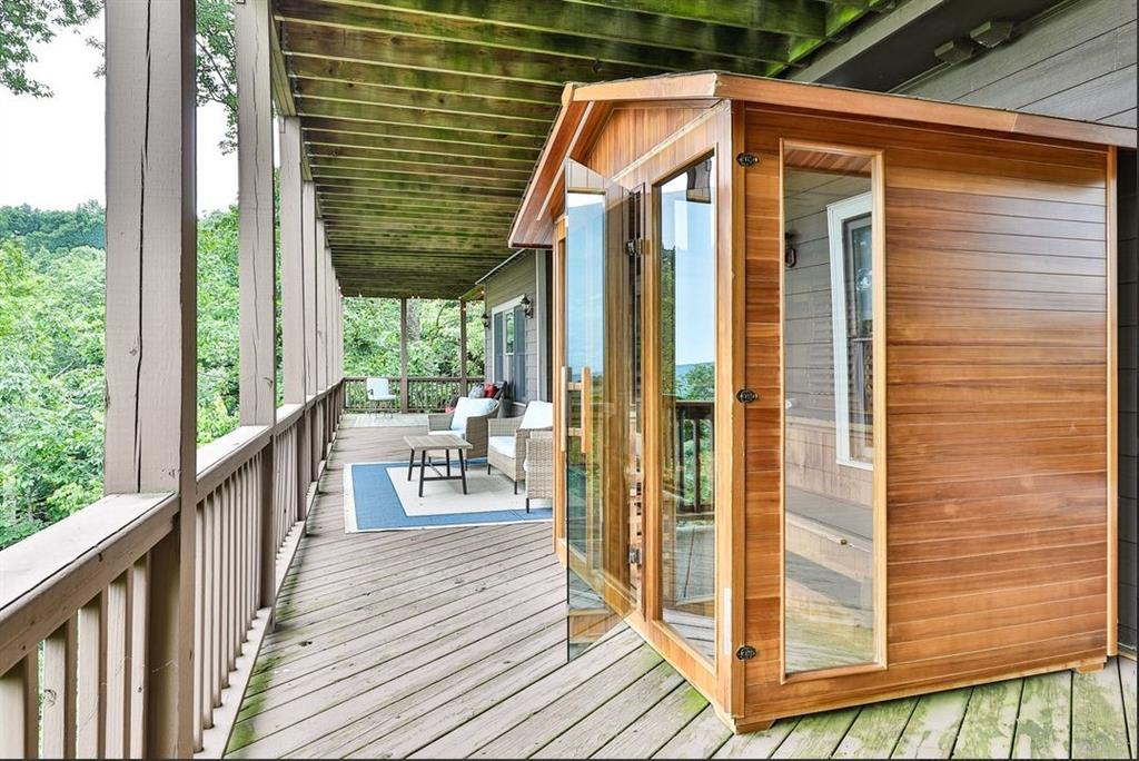 43 Toland Way Big Canoe, GA 30143 - Photo 48 of 50 a view of a balcony with chairs