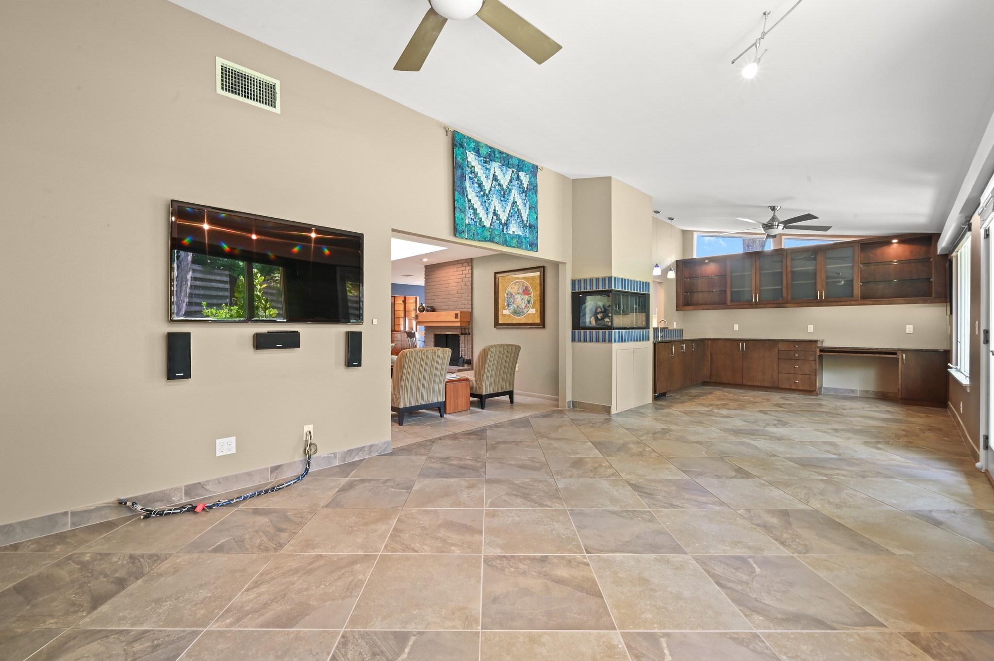 7313 Running Rope Austin, TX 78731 - Photo 14 of 26 The TV room includes a flat screen television and surround sound