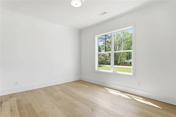 an empty room with windows
