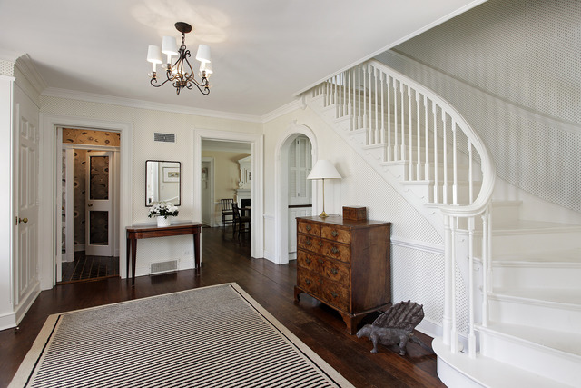 1111 Sunset Road Winnetka, IL 60093 - Photo 2 of 12 a view of hall way with furniture and chandelier