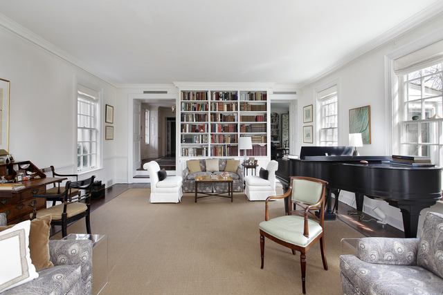 1111 Sunset Road Winnetka, IL 60093 - Photo 4 of 12 a living room with furniture and floor to ceiling windows