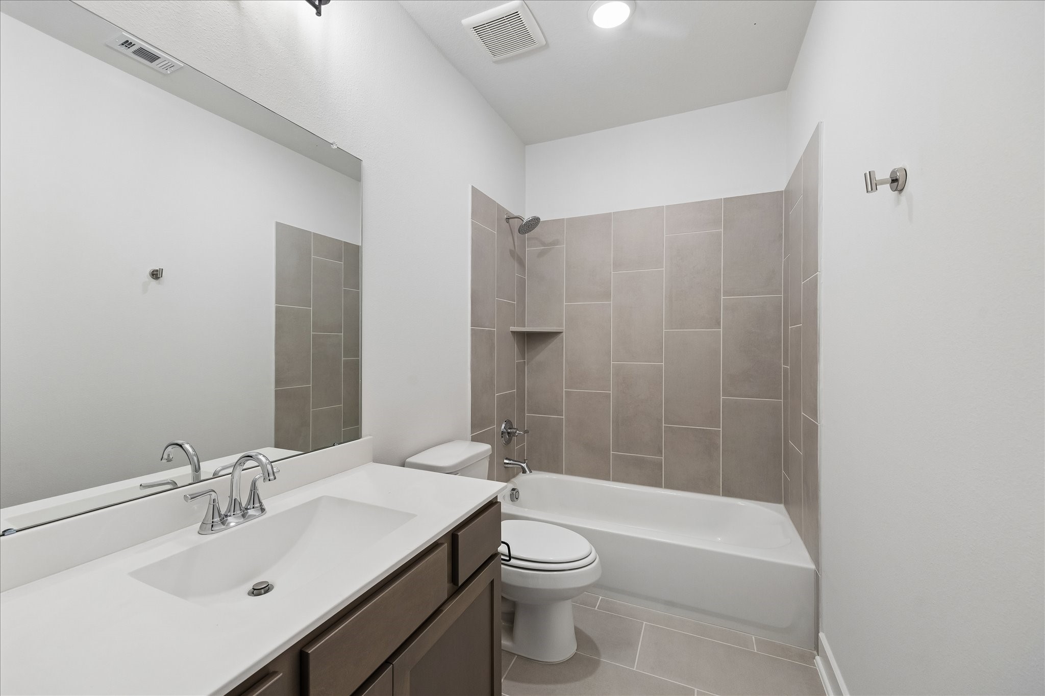 4814 Highland Strm Court Fulshear, TX 77441 - Photo 23 of 34 a bathroom with a sink a toilet and shower
