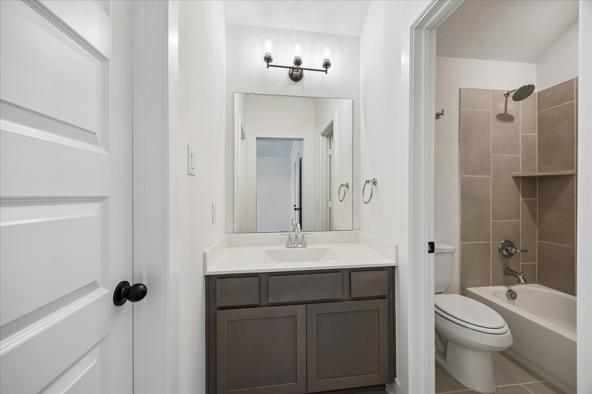 4814 Highland Strm Court Fulshear, TX 77441 - Photo 25 of 34 a bathroom with a sink a toilet and shower
