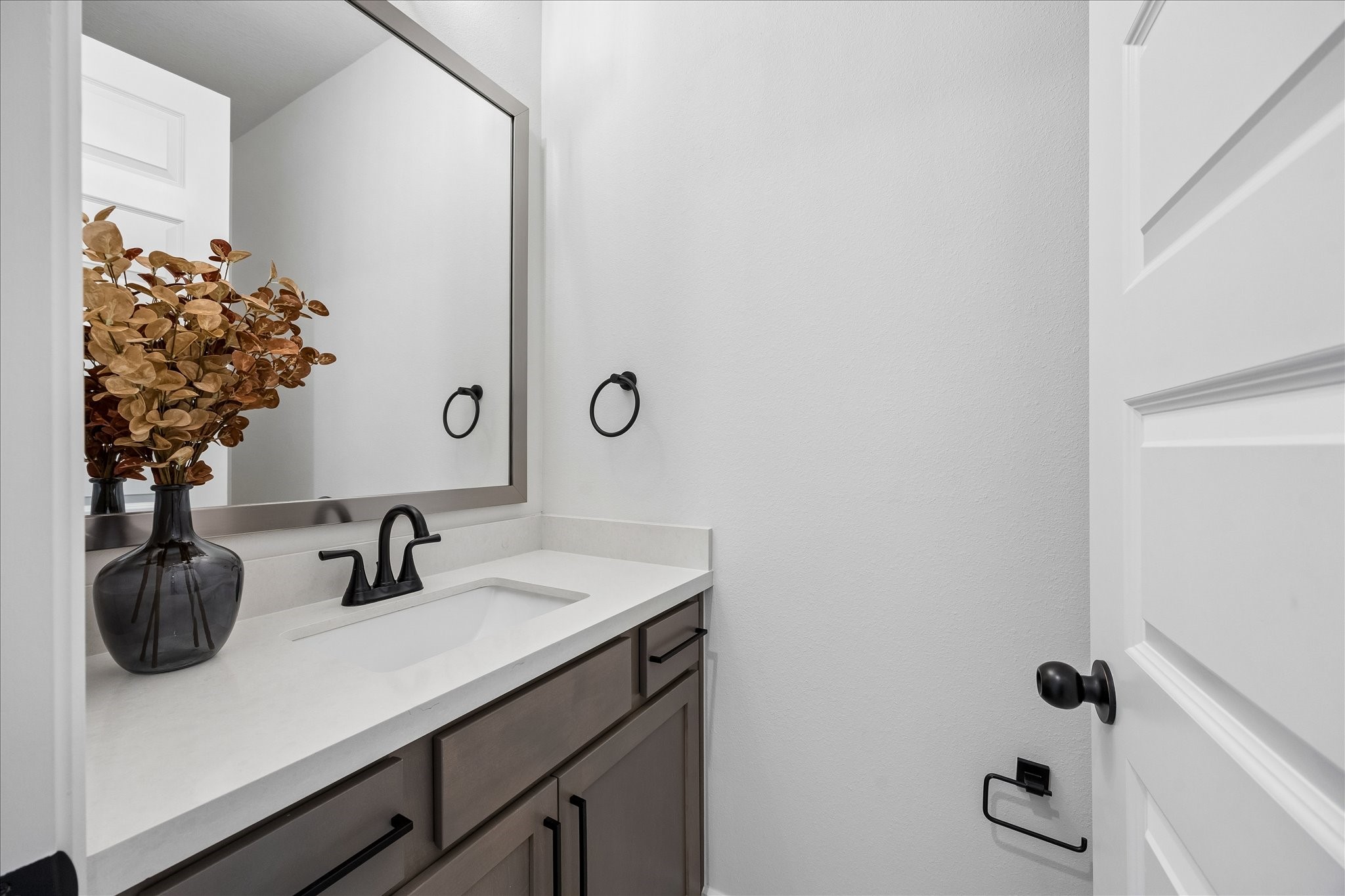 4814 Highland Strm Court Fulshear, TX 77441 - Photo 29 of 34 a bathroom with a sink and a mirror
