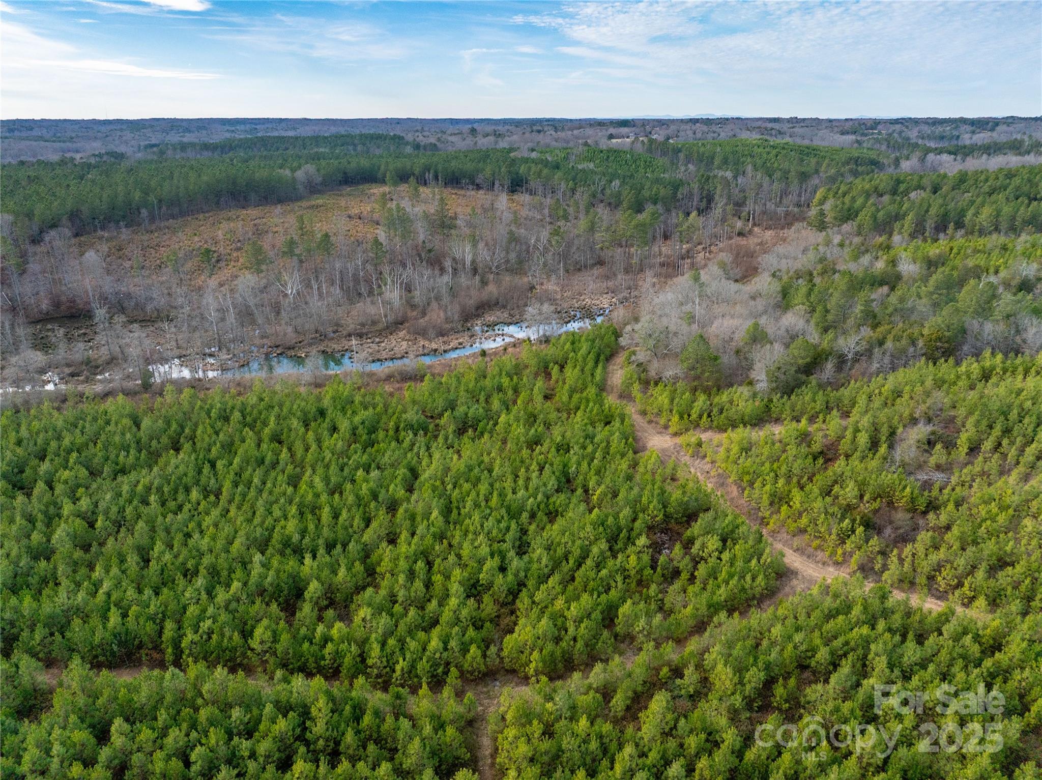 0 Quarter Round Road, Unit 9 Pacolet, SC 29372 - Photo 24 of 46 a view of a lake with houses in the background