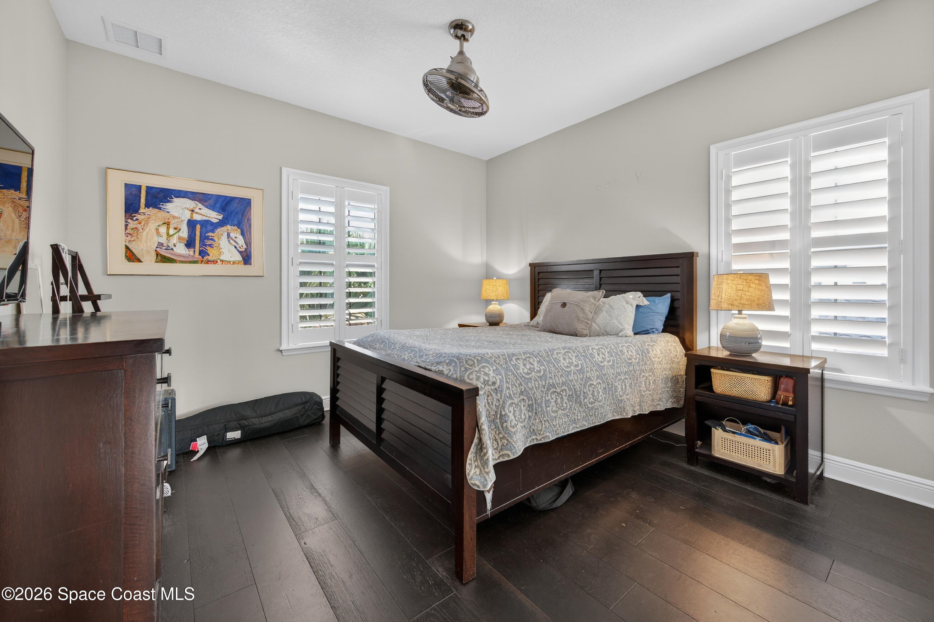 2343 Rodina Drive Melbourne, FL 32940 - Photo 18 of 72 a bedroom with a bed and a window