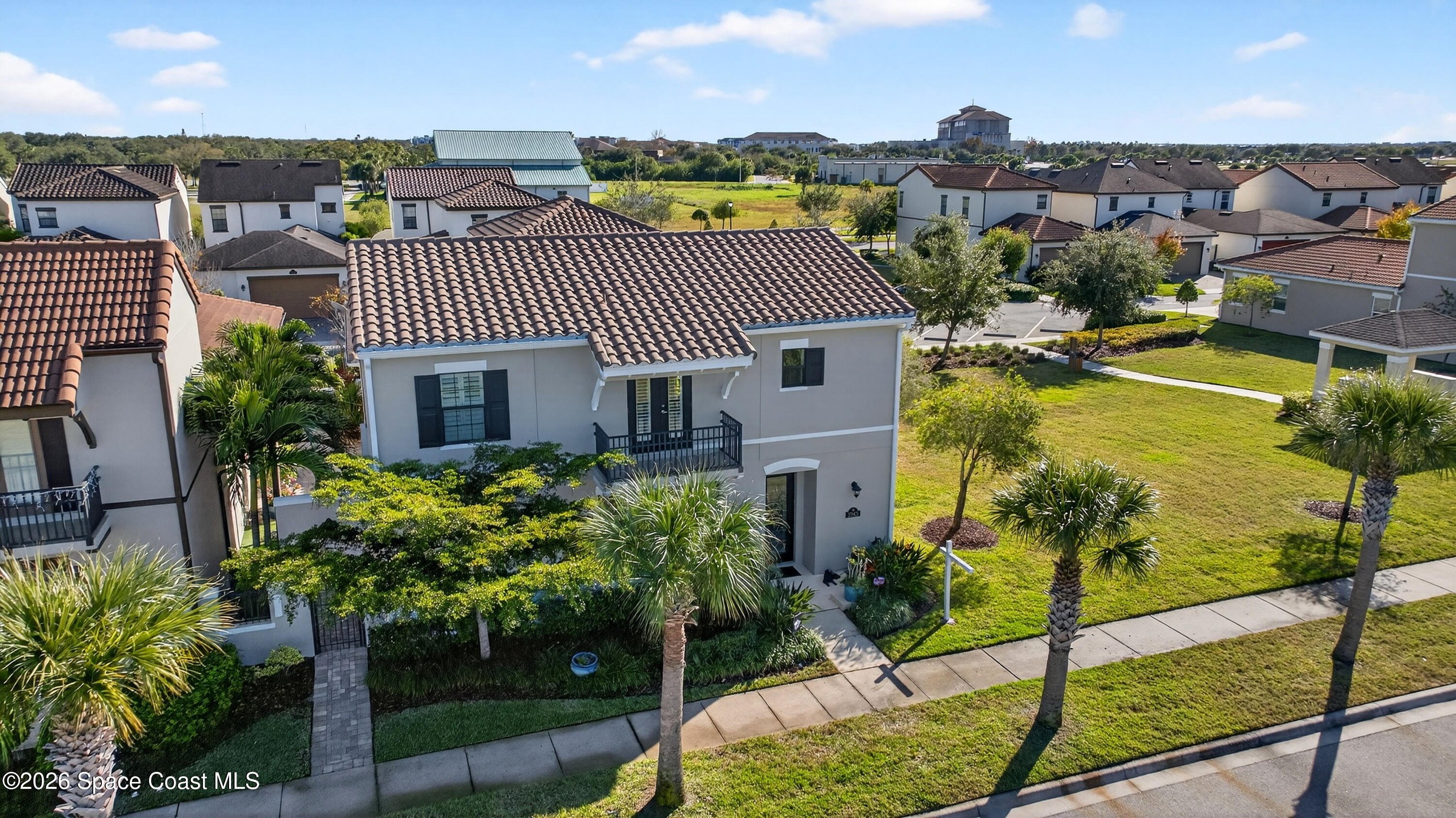 2343 Rodina Drive Melbourne, FL 32940 - Photo 30 of 72 a front view of a house with a garden