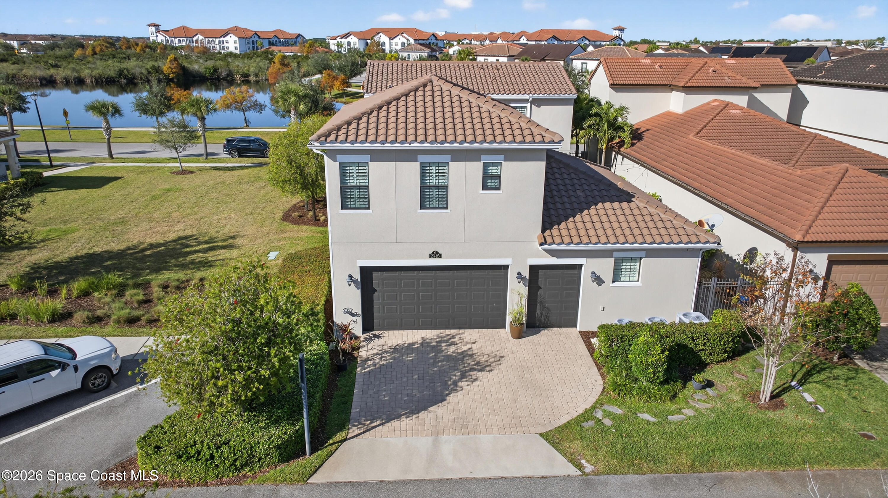 2343 Rodina Drive Melbourne, FL 32940 - Photo 35 of 72 a front view of a house with a yard