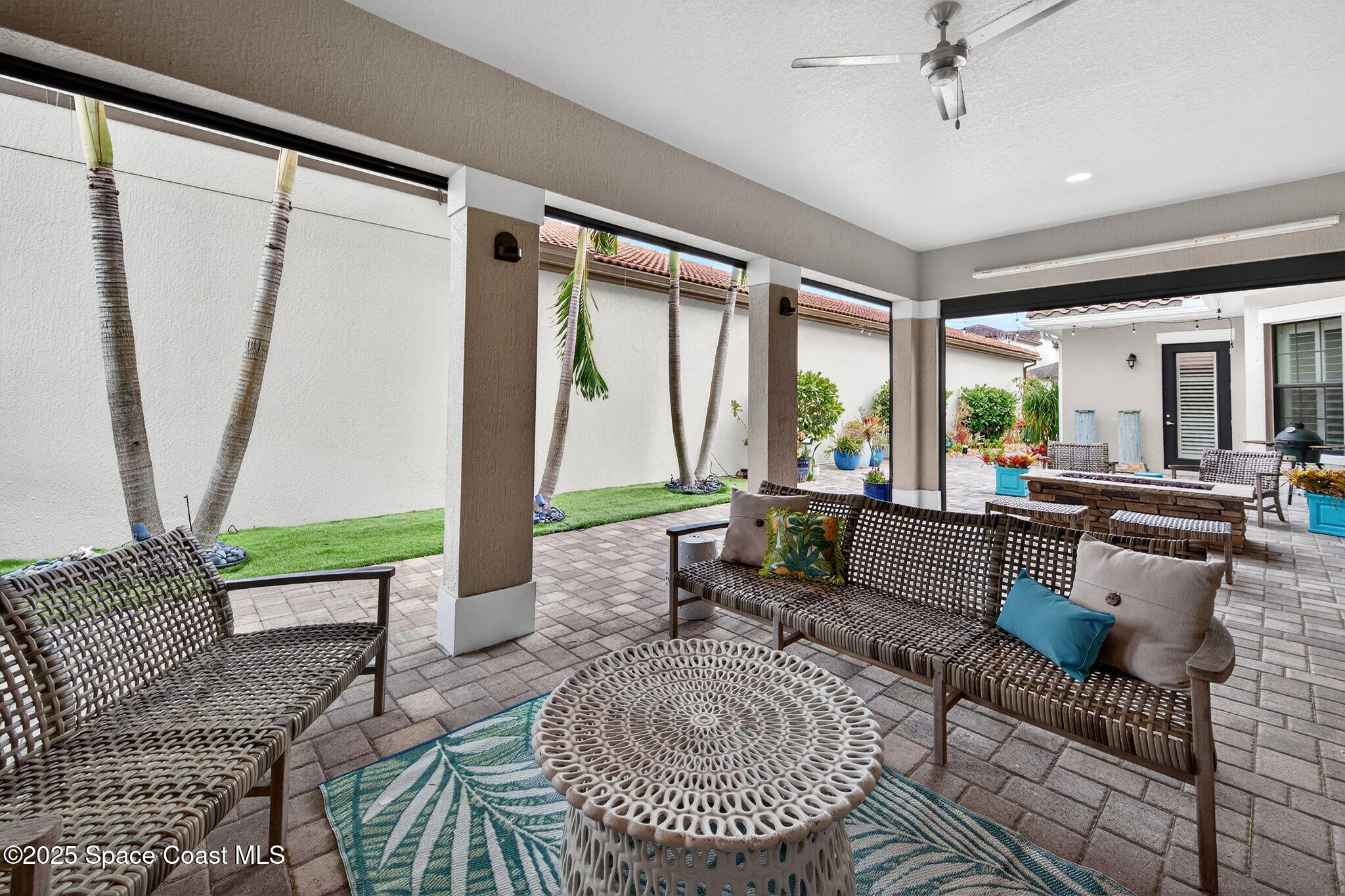 2343 Rodina Drive Melbourne, FL 32940 - Photo 50 of 72 a living room with furniture and a large window