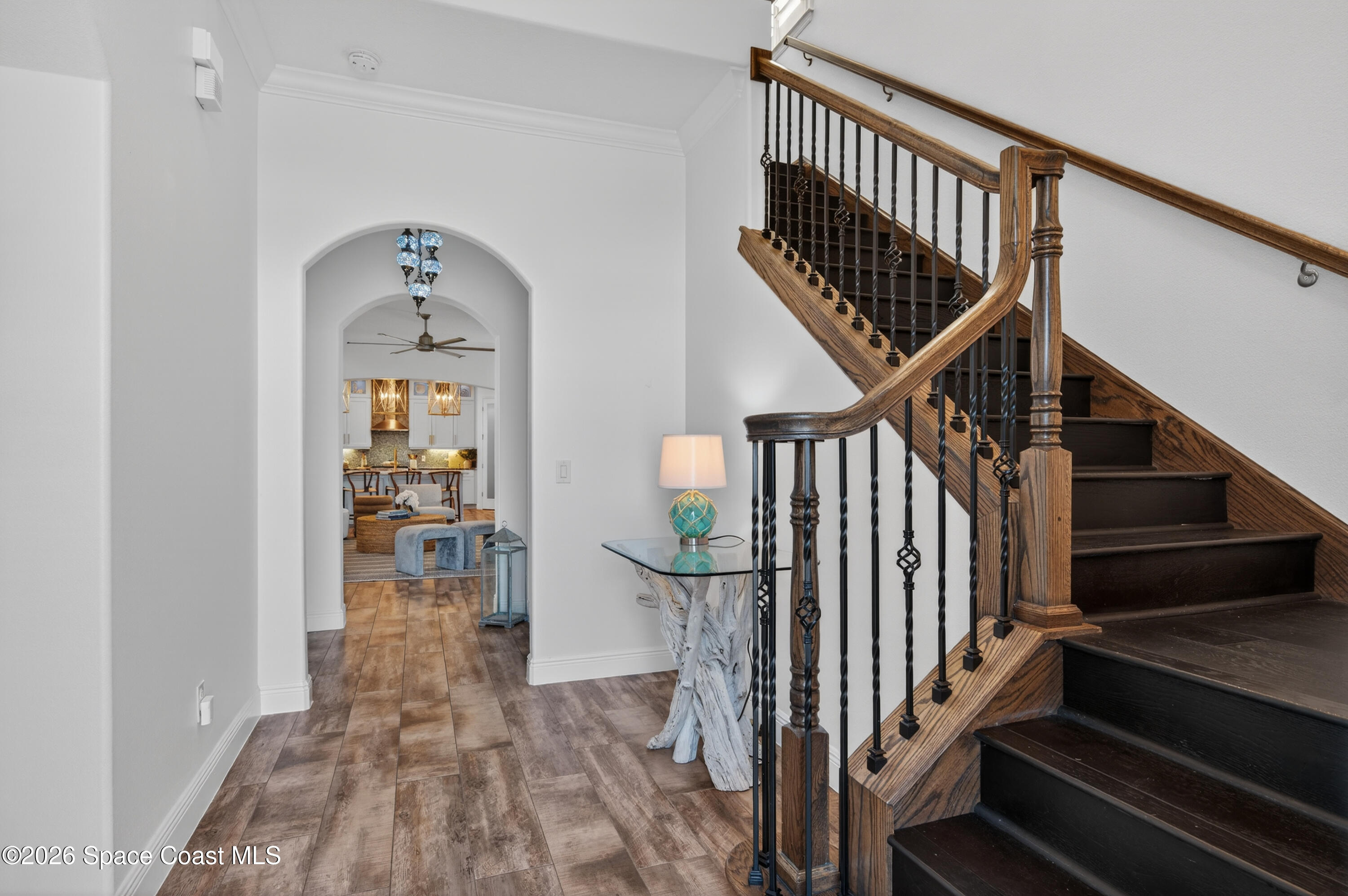 2343 Rodina Drive Melbourne, FL 32940 - Photo 56 of 72 a view of entryway with wooden floor and stairs