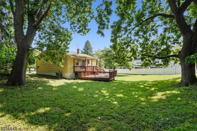a house view with a garden space