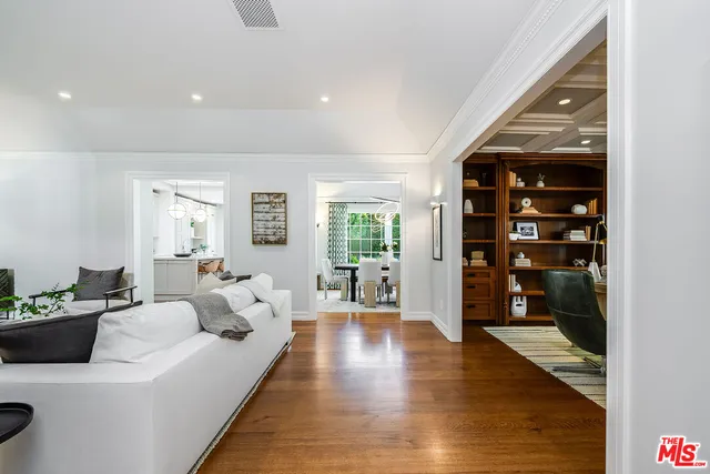 a kitchen with stainless steel appliances granite countertop a stove and a refrigerator