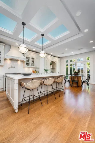 a living room with furniture fireplace and window