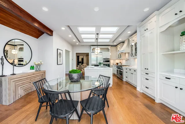 a bedroom with a bed and a chair