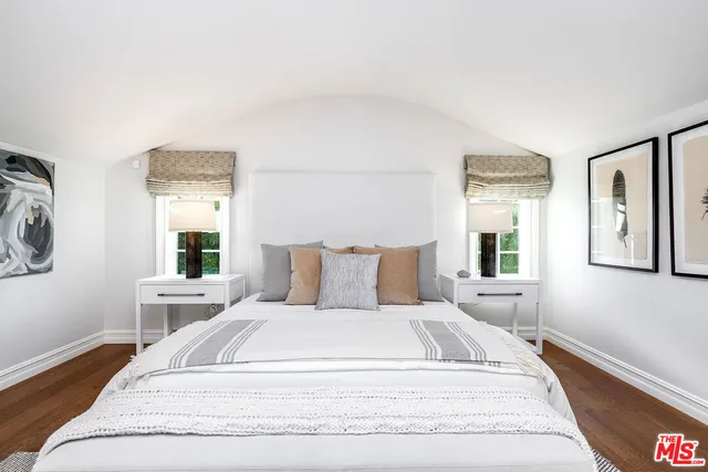 a bathroom with a sink a vanity and a mirror