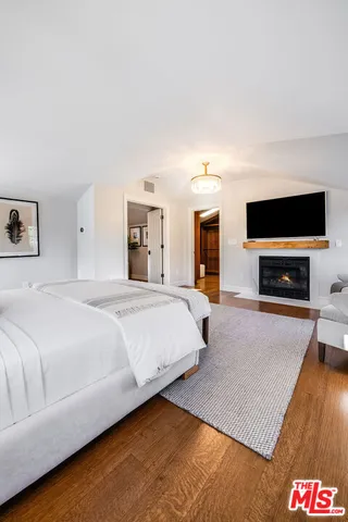 a view of a house with swimming pool and porch